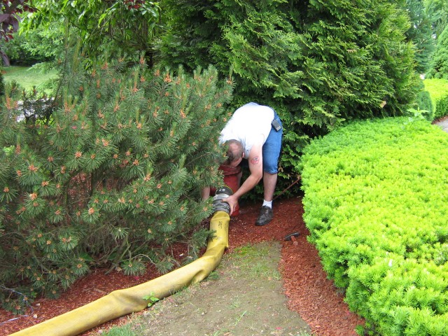 1st Lieutenant Keeler connects the supply line to the hydrant in the Highfields complex during our hydrant inspection.