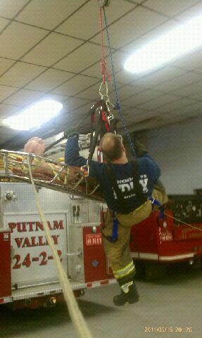 The FAST Team doing rope rescue FF Schiffer attending to the victim.